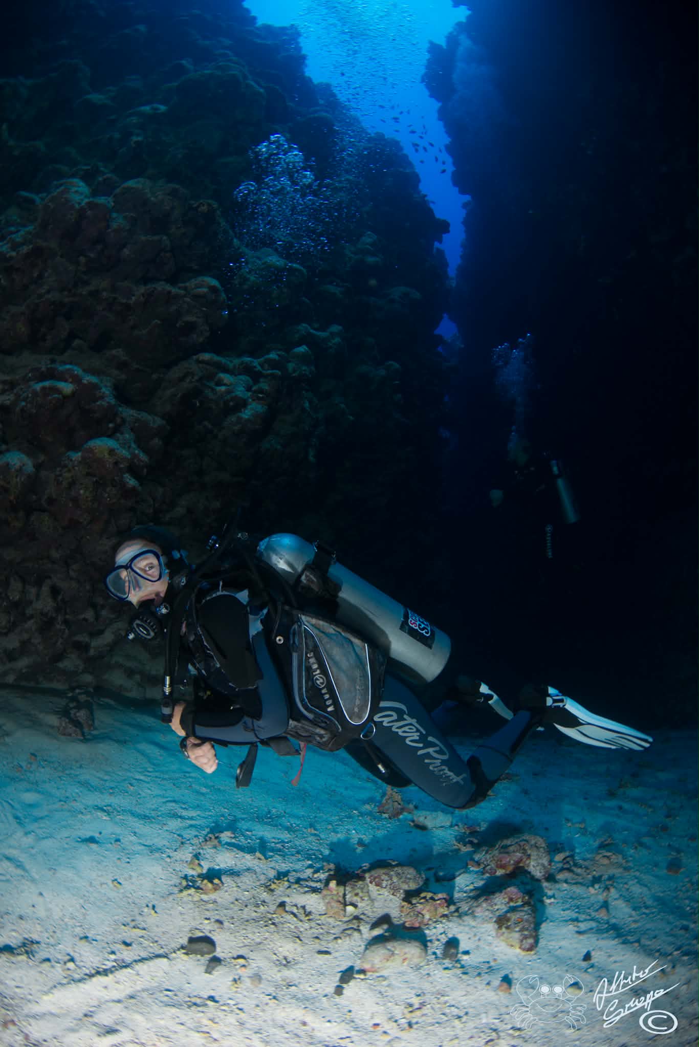 Alex diving in the Canyon in Dahab, looking relaxed and at home underwater